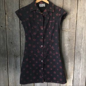 Short fitted snap front black dress w/red stars